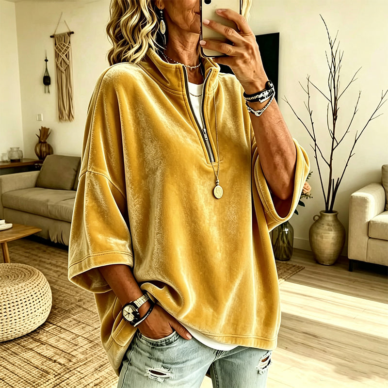 Fluwelen damesblouse met 3/4 mouwen en halve ritssluiting
