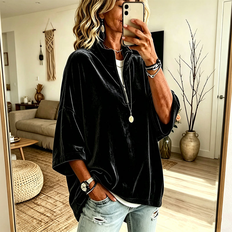 Fluwelen damesblouse met 3/4 mouwen en halve ritssluiting