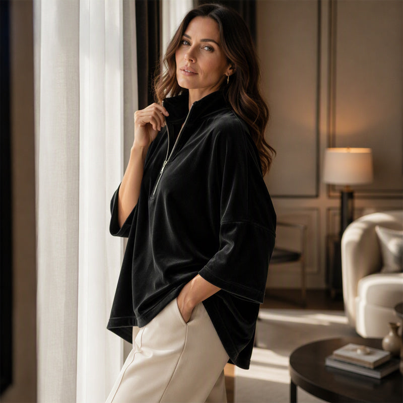 Fluwelen damesblouse met 3/4 mouwen en halve ritssluiting