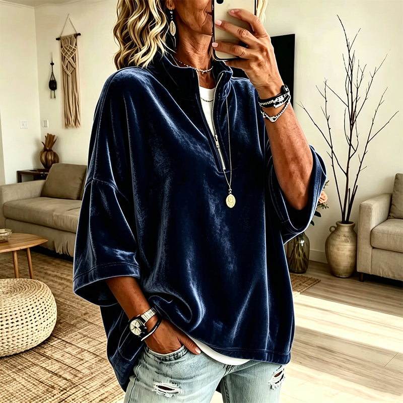 Fluwelen damesblouse met 3/4 mouwen en halve ritssluiting