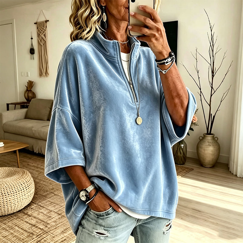 Fluwelen damesblouse met 3/4 mouwen en halve ritssluiting